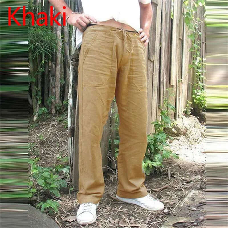 Khaki cotton linen trousers for men, casual loose fit with elastic waist, summer fashion pants with a natural outdoor backdrop.