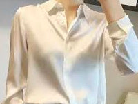 Elegant white silk blouse from all-in-1store.com perfect for a chic and sophisticated look.