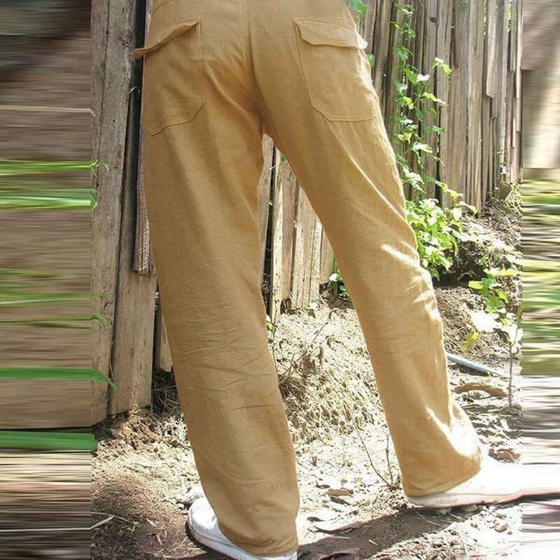 Khaki cotton-linen men's trousers with pockets, perfect for summer casual wear, shown outdoors for fashion styling.