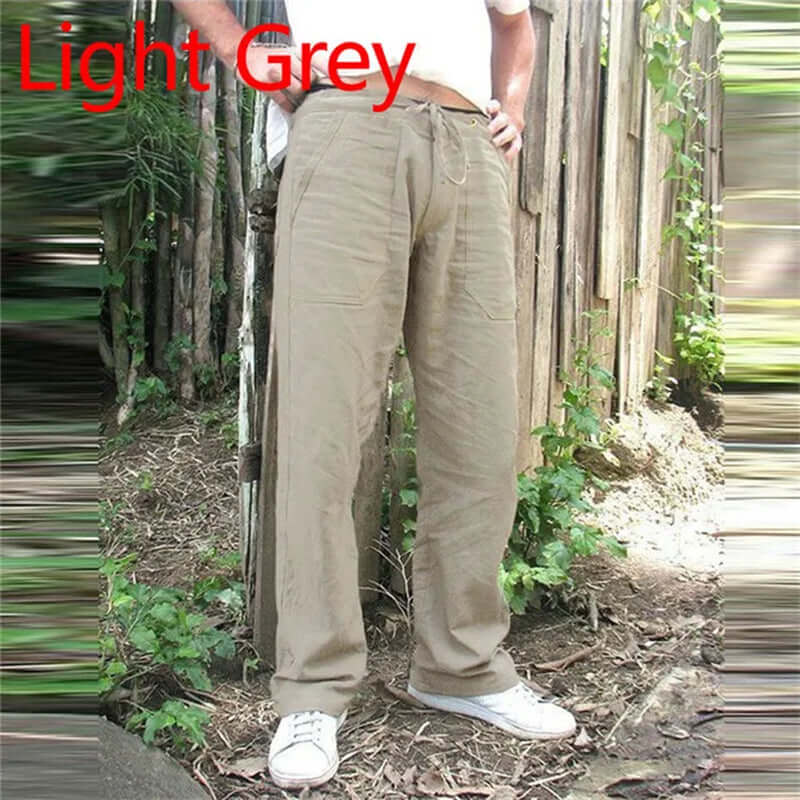 Light grey cotton linen trousers for men, casual and loose fit with an elastic waist, perfect for summer comfort and style.